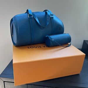 Louis Vuitton Papillon Bag with mini attached.